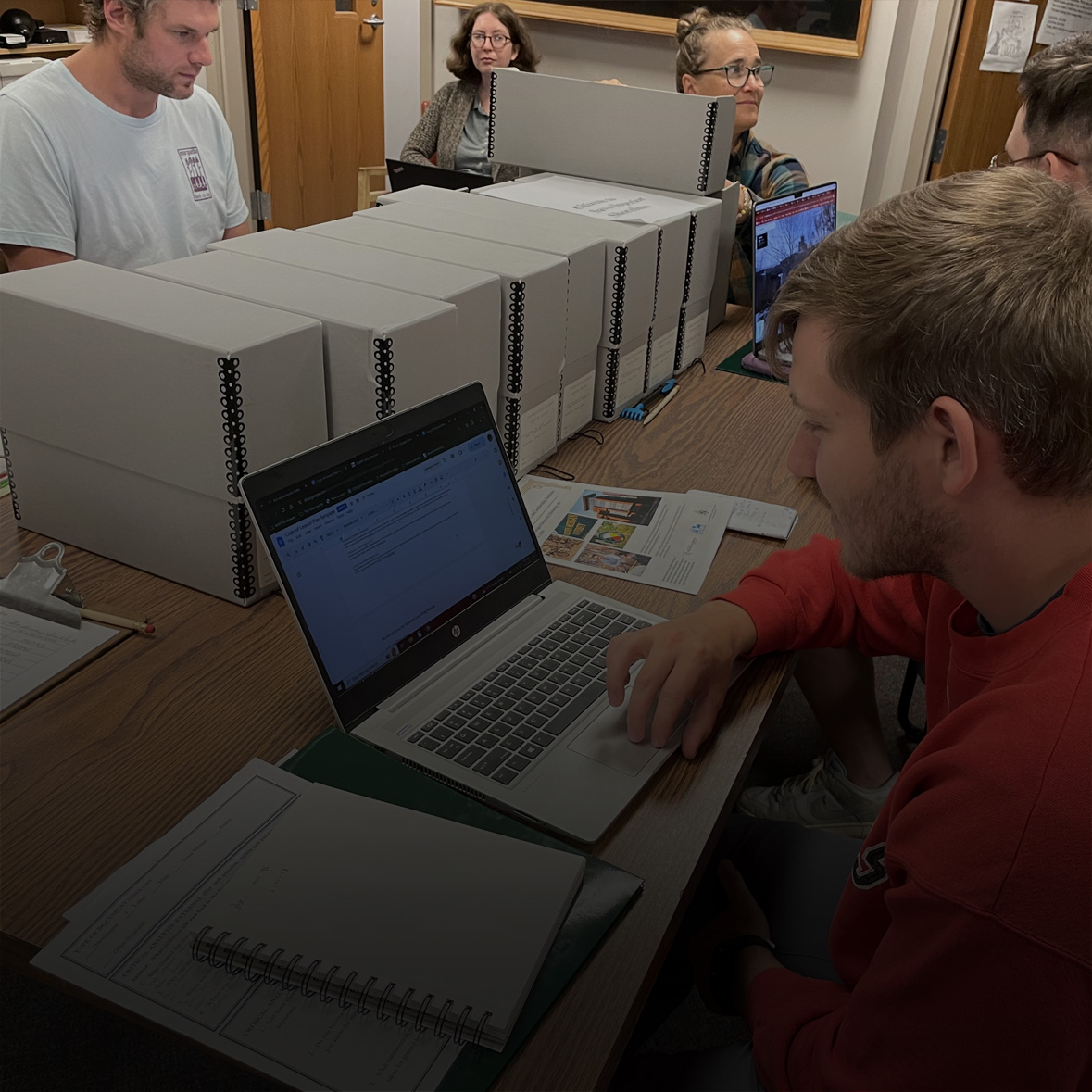 Students working in archive