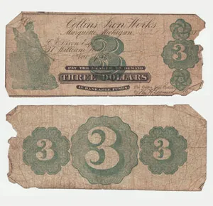 Front and back views of a worn three-dollar paper note issued by Collins Iron Works in Marquette, Michigan, featuring green decorative number 3 seals and a seated figure illustration.